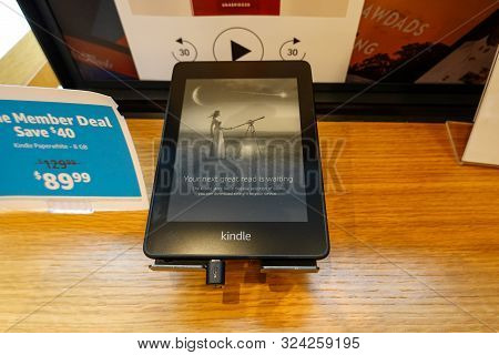 Seattle, Wa/usa-6/15/19: An Amazon Kindle Paperwhite Device On Sale At An Amazon Book Store.