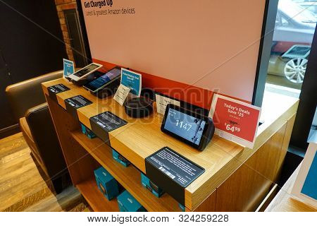 Seattle, Wa/usa-9/15/19:  A Display Of Amazon Electronic Devices Such As, Kindle, Echo Dot, Tablet, 