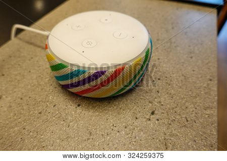 Seattle, Wa/usa-6/15/19:  A Rainbow Colored, Amazon Echo Dot Alexa, Is A Virtual Assistant Developed