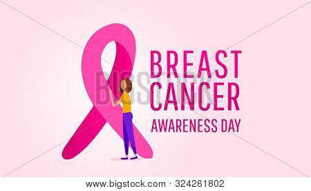 Creative Banner Of The Fight Against Breast Cancer. A Young Girl Stands Next To A Large Pink Silk Ri