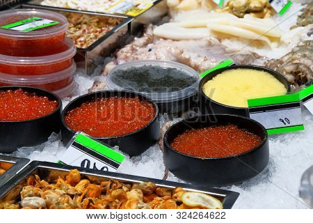Red And Black Fish Caviar In Fish Market. Fish Roe Caviar. Fish Seafood On Shop.