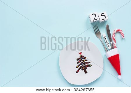 Christmas Composition Calendar December 25. Sweet Chocolate Christmas Tree On Plate, Cutlery In Sant