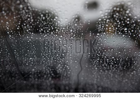 Water Drop On Wind Shield. Rain Drops On Window.raindrop Outside Car Mirror.