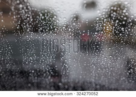 Water Drop On Wind Shield. Rain Drops On Window.raindrop Outside Car Mirror.