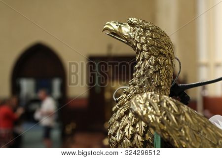Gold Eagle Statue Podium In A Church