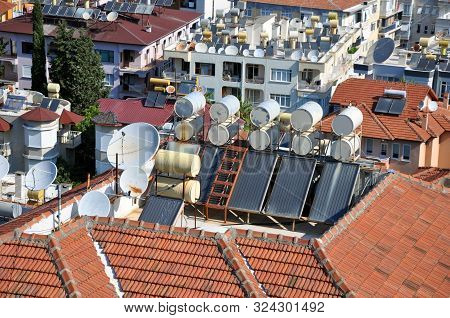 Solar Water Heater Boiler Close Up Shot On Residentual House Rooftop