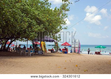 Seminyak, Bali Sep 20 Wide Sand Beach With Tourists, Near Kuta Indonesia