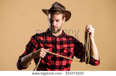 Rodeo Hero. Wild West Rodeo. Man In Hat. Western Cowboy Portrait. Man Checkered Shirt On Ranch. Cowb