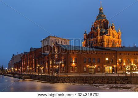 Helsinki, Finland- 28 February 2015: View Of Old Red Brick Buildings On The Waterfront. Night City I