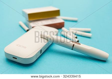 St. Petersburg, Russia - 08.08.2019: Iqos Is An Innovative Tobacco Heating System, An Alternative To