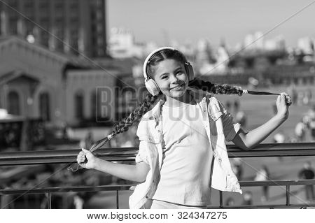 City Guide And Audio Tour. Girl Little Tourist Kid Explore City Using Audio Guide Application. Free 
