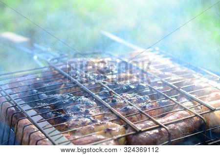Poor And Improper Cooking Meat On Fire. Toasted Meat With Overcooked Crust