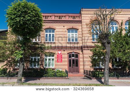 Czluchow, Poland - June 9, 2019: Head Office Of Powiat Czluchow And School In Czluchow.