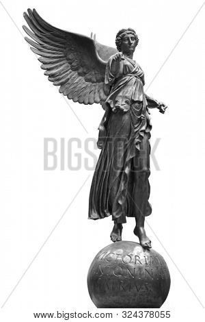 Bronze statue of a Winged Victory. Frontal view of a Statue of the goddess Nike, isolated on white background by clipping path
