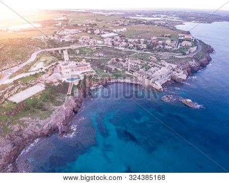 Wondeful Aerial View At Sunset Of The Tafuri Castle And The Coastline Of Portopalo, A Town In The So
