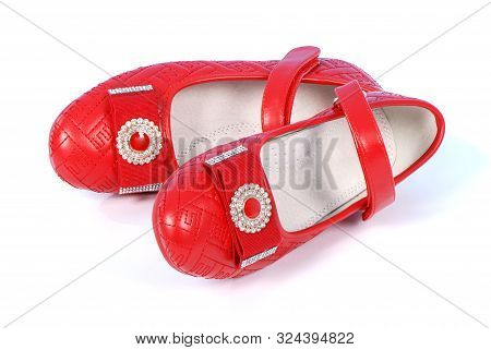 Chilren Red Shoes On White Background. High Resolution Photo. Full Depth Of Field.