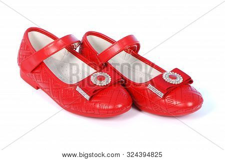 Chilren Red Shoes On White Background. High Resolution Photo. Full Depth Of Field.