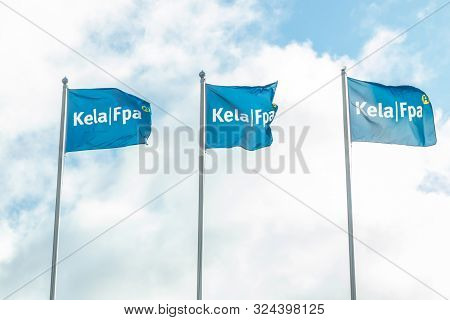 Kouvola, Finland - 22 September 2019: Flags Of Kela. Kela Is Finnish Social Insurance Institution.