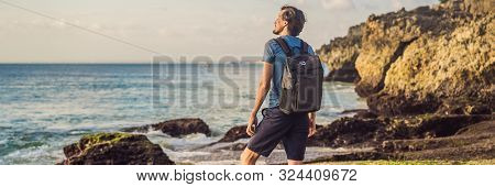 Young Man Tourist On Pantai Tegal Wangi Beach, Bali Island, Indonesia. Bali Travel Concept Banner, L