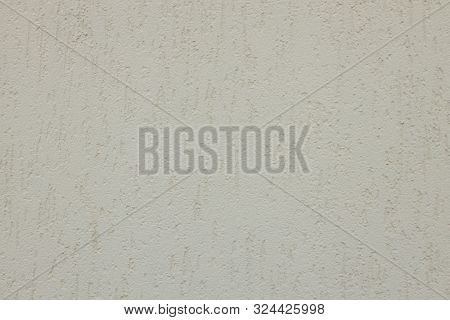 Top View Of White Uneven Painted Wall Of Building
