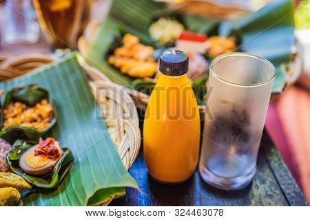 Jamu. Traditional Medicine And Herbal Drink In Indonesia, Most Prevalent In Java. Made From Natural 