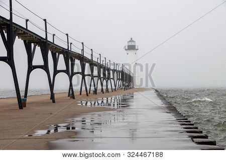Manistee North Pier Head Lighthouse On A Foggy Day