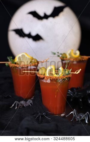 Michelada - Mexican Alcoholic Cocktail, Tomato Juice, Spicy Sauce And Spices. Great Idea For A Hallo