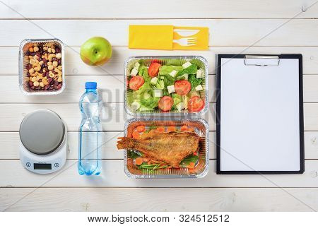 Dates, Cashews And Hazelnuts, Fish With Sliced Carrot, Lettuce, Tomato And Feta Salad, An Apple, Pla