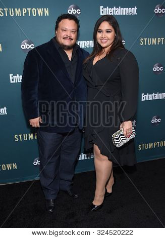 LOS ANGELES - SEP 16:  Adrian Martinez and Emy Cee arrives for 'Stumptown' Season 1 Premiere on September 16, 2019 in Los Angeles, CA                