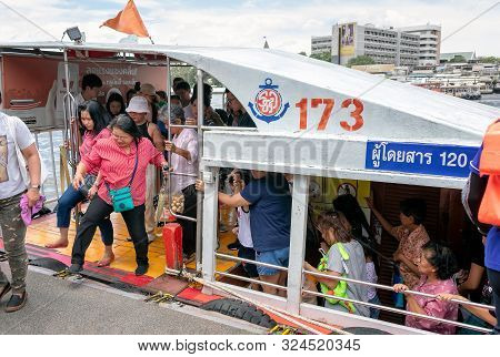 Bangkok, Thailand - September 22: Unnamed Rush Hour Commuters Lines Up To Get Off The Public Ferry 1