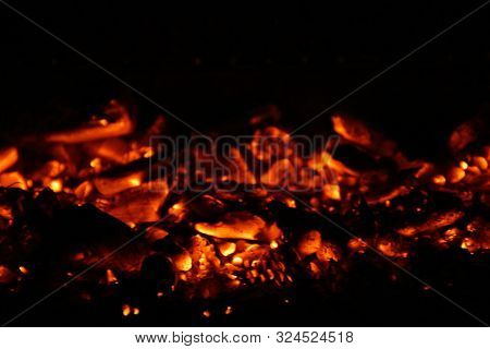 Burning Coal That Remains When The Burning Fuel Has Burned Away. Bright, Hot Embers. Hot And Bright 