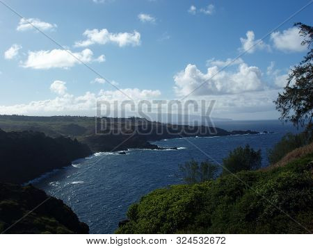 Rocky West Maui Coastline During The Day.