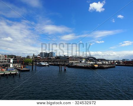 Seattle, Wa - May 18, 2019:  Boats And Piers In Seattle Harbor During The Day Seen From The Ocean.