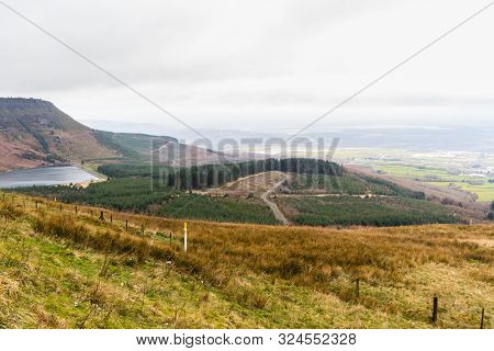 View Over Welsh Countryside, The Vale Of Neath With Reservoir Or Dam.