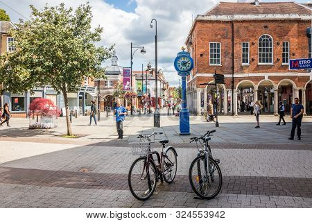 High Wycombe, England - August 15th 2019: Bicycles In Front Of The Millenium Clock And The Guildhall