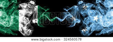 Nigeria Vs Micronesia, Micronesian Abstract Smoky Mystic Flags Placed Side By Side. Thick Colored Si