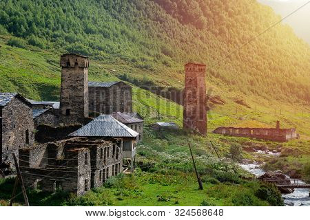 View Of The Ushguli Village At The Foot Of Mt. Shkhara. Picturesque And Gorgeous Scene. Rock Towers
