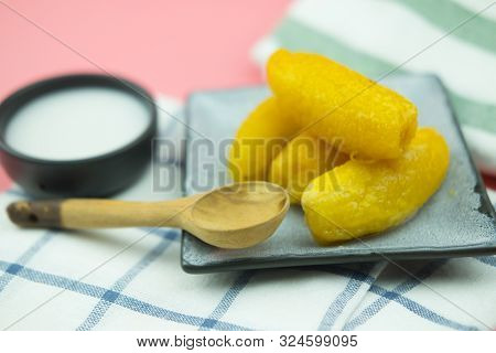 Thai Dessert (kluay Khai Chueam) : Baby Bananas In Heavy Syrup, Topped With Coconut Milk. Thai Popul