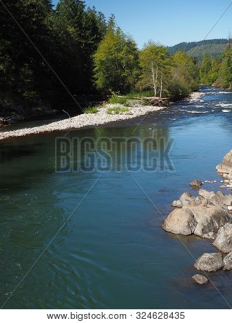 The Rocky And Rugged Shores Of The Middle Fork Of The Willamette River Near Oakridge Oregon Filled W