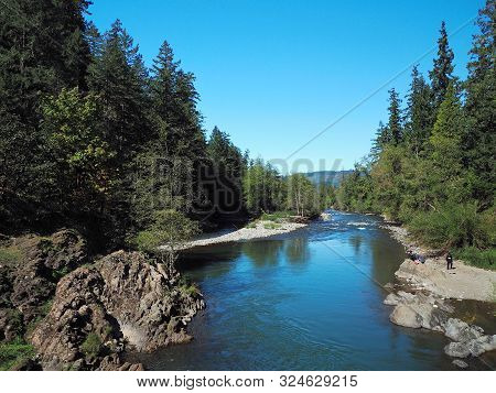 The Rocky And Rugged Shores Of The Middle Fork Of The Willamette River Near Oakridge Oregon Filled W
