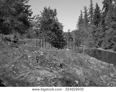 The Rocky And Rugged Shores Of The Middle Fork Of The Willamette River Near Oakridge Oregon Filled W