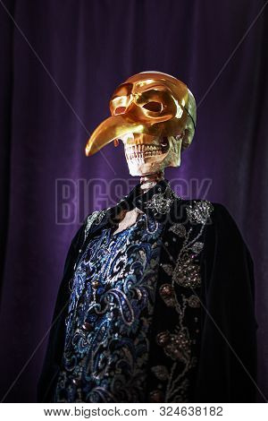Gentleman Skeleton In Doublet And Gold Plague Doctor Mask, Waiting For Halloween
