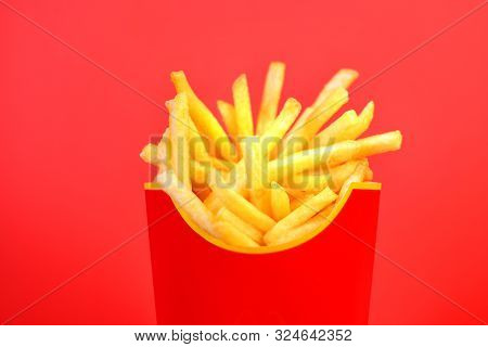 Frybox With French Fries On A Red Background, Close-up