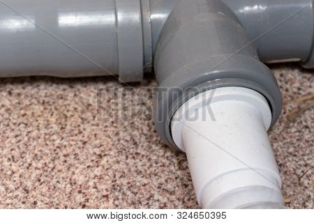 Sewer Pipes In Home, Connection Of Grey Polipropilen Pipes And White Corrugated Pan Pipe For Shower 