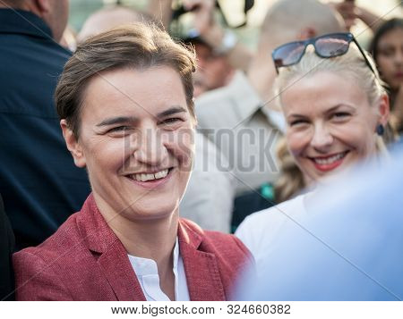 Belgrade, Serbia - September 15, 2019:  Prime Minister Ana Brnabic Smiling Next To Her Partner, Mili