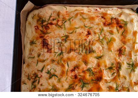 Homemade Italian Focaccia Modenese, With Rosemary And Olive Oil/ Freshly Baked And Ready To Eat