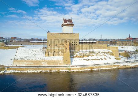 The Old Herman Castle Is A Close-up In The Cityscape On A Sunny March Day. Narva, Estonia