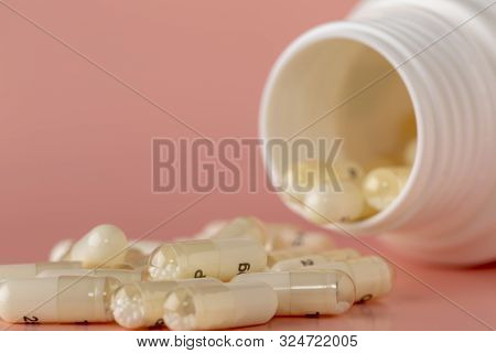 Medicinal Bottle And Scattered Transparent Capsules With Microgranules Of Lecticide