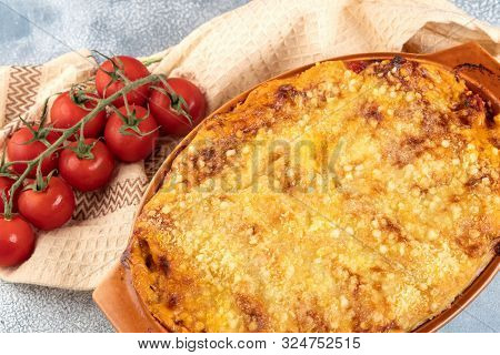 Traditional Italian Cannelloni With Vegetables, Minced Meat And Cheese. On A Wooden Background. Top 
