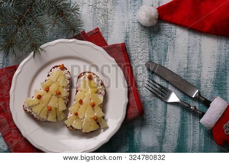 New-year Sandwiches With Cheese, Pineapples And Crab Stiks In The Form Of A Christmas Tree And Decor
